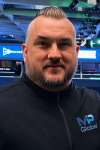 Headshot of the author of The New Business Reality: AI and Cybersecurity